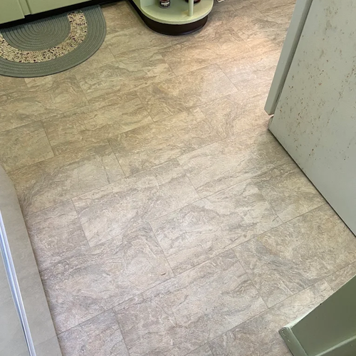 Tile installation on the kitchen by Barts Carpet Sales