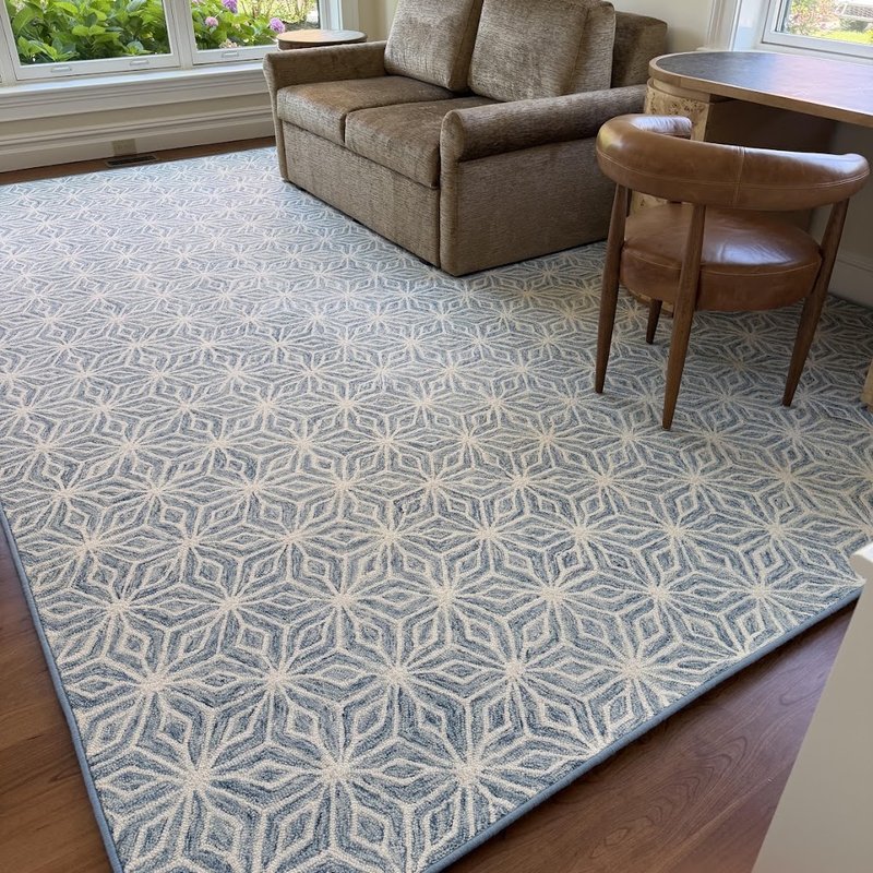 A geometric Nourison pattern, custom bound for the living room